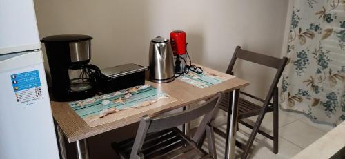 Kuchyň nebo kuchyňský kout v ubytování SEA VIEW APARTMENTS Artemis