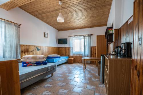 Postel nebo postele na pokoji v ubytování VillaDudek