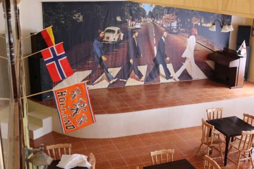 a room with a painting on the wall at Hotel Yellow Submarine in Punta Arenas