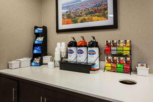 a counter in a hotel room with products on it at Baymont by Wyndham Traverse City in Traverse City