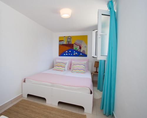 Posteľ alebo postele v izbe v ubytovaní Apartmani AD Hvar