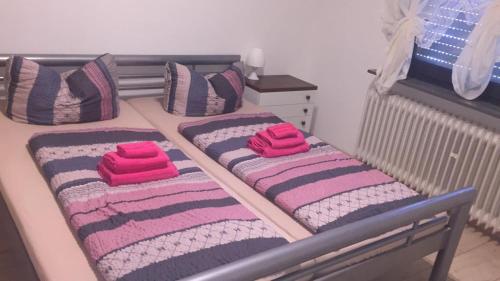 Ένα ή περισσότερα κρεβάτια σε δωμάτιο στο Ferienwohnung Lahnstein
