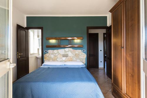 Ein Bett oder Betten in einem Zimmer der Unterkunft Agriturismo Il Fontanile