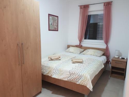 Postel nebo postele na pokoji v ubytování Villa Niva