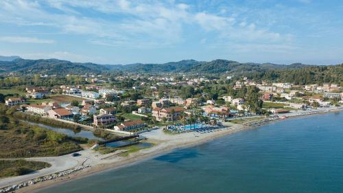 an aerial view of a town next to the water at Monika Hotel Sidari in Sidari