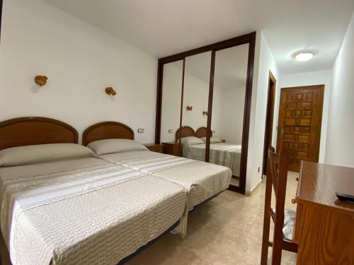 Postel nebo postele na pokoji v ubytování La Tejera