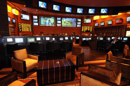 a bar with television screens in a casino at M Resort Spa & Casino in Las Vegas
