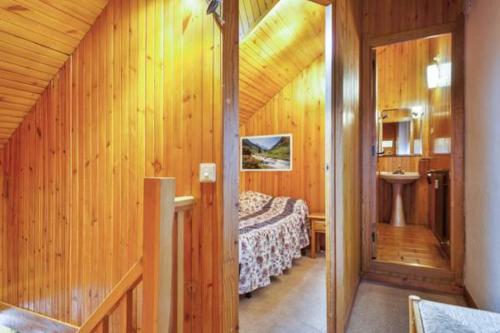 Postel nebo postele na pokoji v ubytování Vielha centro duplex Sapporo