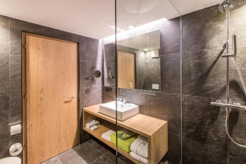 ห้องน้ำของ Kronplatz-Resort Hotel Kristall