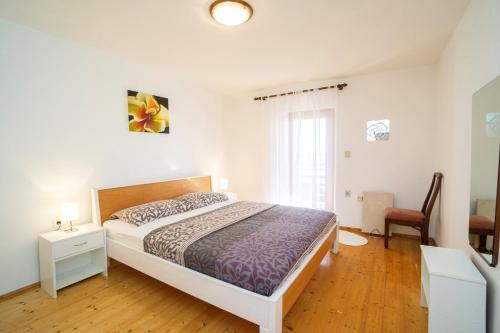 Postel nebo postele na pokoji v ubytování Apartment Nives
