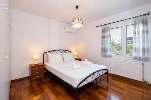 Krevet ili kreveti u jedinici u okviru objekta Beautifully renovated flat in superb location