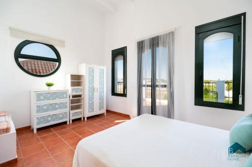 Postel nebo postele na pokoji v ubytování Duplex Aldea Del Coto