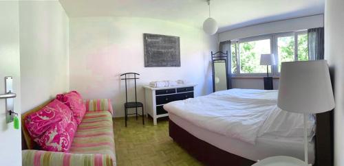 Postel nebo postele na pokoji v ubytování Charmantes Apartment