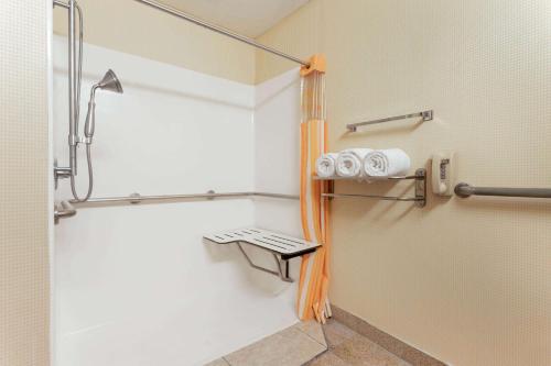a shower in a bathroom with a shower curtain at La Quinta by Wyndham Frankfort in Frankfort
