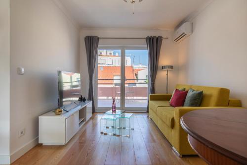 Sunny 1BDR Apartment With Terrace by LovelyStay