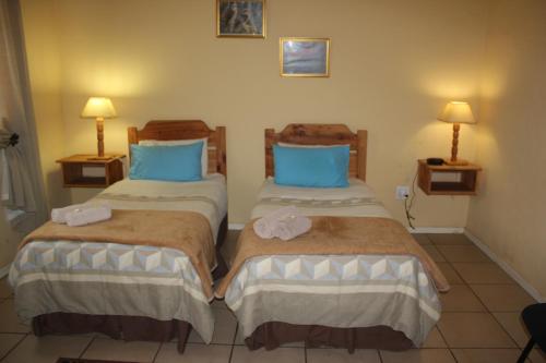 Katil atau katil-katil dalam bilik di The Old Mill Hotel