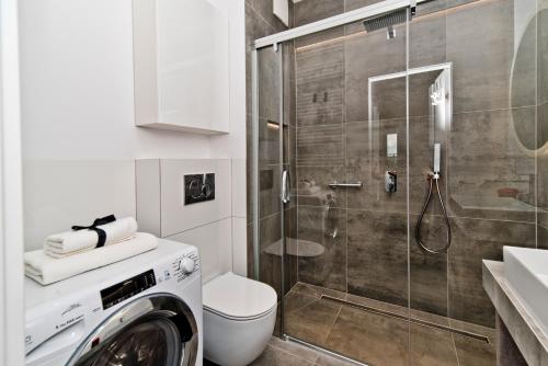Łazienka w obiekcie BlueApart Apartamenty Nexo