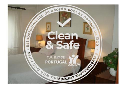 Кровать или кровати в номере Pensão Residencial Luanda