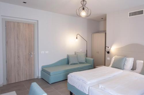 epOche Hotel Zanella 1889にあるベッド