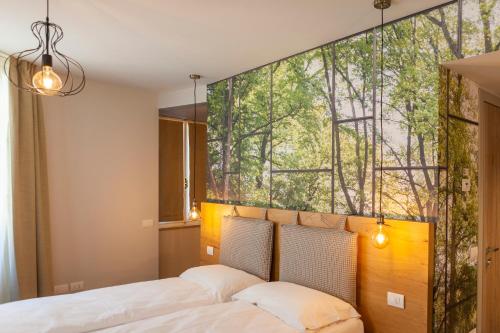 epOche Hotel Zanella 1889にあるベッド