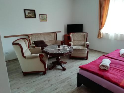 Χώρος καθιστικού στο Frosch Haus Ferienwohnungen
