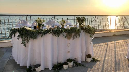 a table set up for a wedding on a cruise ship at Hotel Neva in Podstrana