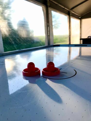 two red hearts sitting on the floor of a building at Resto domki letniskowe in Sarbinowo