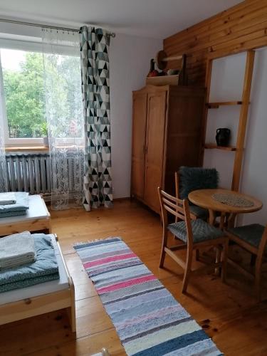 Postel nebo postele na pokoji v ubytování Zacisze pod Gołyską