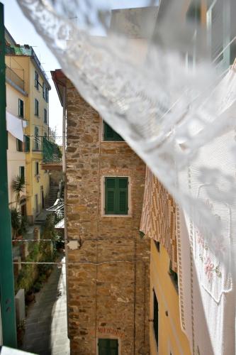 a view from a window of a brick building at CATEO in Riomaggiore