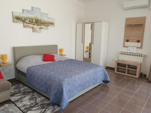 Posteľ alebo postele v izbe v ubytovaní Studio apartmani Toplička bajka