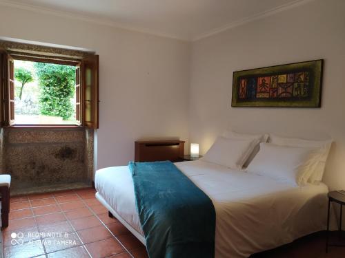 Postel nebo postele na pokoji v ubytování Casa de Panque