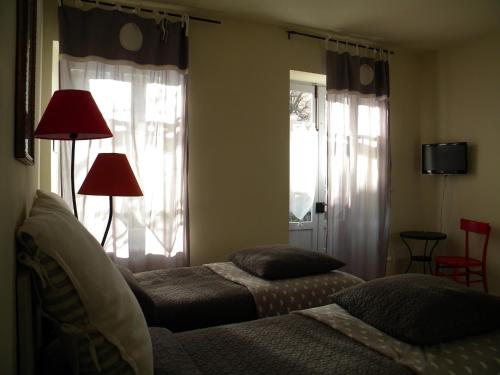Ένα ή περισσότερα κρεβάτια σε δωμάτιο στο B&B Autin