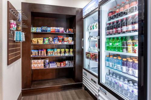 a refrigerator filled with lots of food and drinks at La Quinta by Wyndham New Braunfels in New Braunfels
