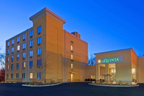 a rendering of a hotel with a building at La Quinta by Wyndham Danbury in Danbury