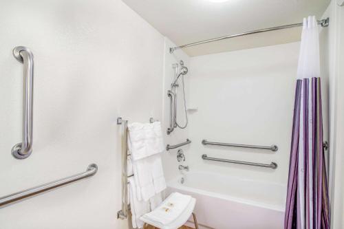 a bathroom with a shower and a toilet at La Quinta by Wyndham Danbury in Danbury