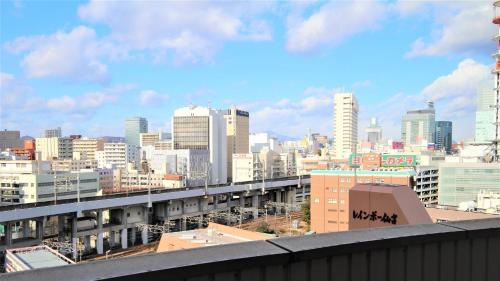 a view of a city skyline with tall buildings at ANA Holiday Inn Sendai by IHG in Sendai