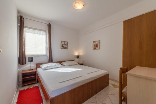 Posteľ alebo postele v izbe v ubytovaní Lavanda Apartment