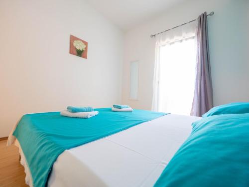 Ένα ή περισσότερα κρεβάτια σε δωμάτιο στο Cozy apartment with breakfast on request 1