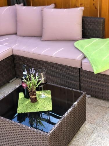 a couch sitting on top of a table at Landhaus Daum in Schwendau