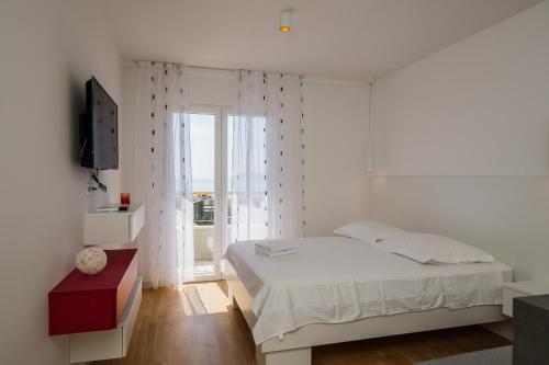 Posteľ alebo postele v izbe v ubytovaní Gujinović