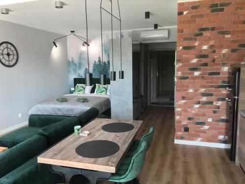 Ένα ή περισσότερα κρεβάτια σε δωμάτιο στο Marina Green Loft-Apartament przy promenadzie