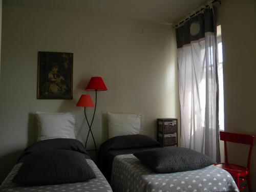 Ένα ή περισσότερα κρεβάτια σε δωμάτιο στο B&B Autin