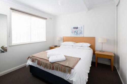 Katil atau katil-katil dalam bilik di Bayview Apartments by Classic Holidays