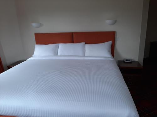 Krevet ili kreveti u jedinici u okviru objekta Laggan Hotel