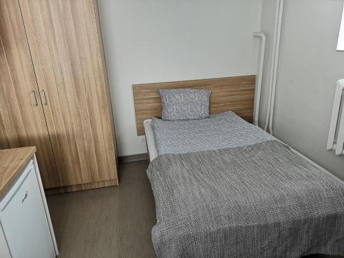 Letto o letti in una camera di COMFY Patogūs namai