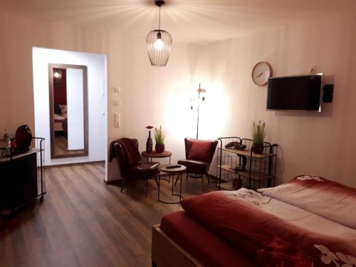 Μια τηλεόραση ή/και κέντρο ψυχαγωγίας στο Weinlodge am Geissberg