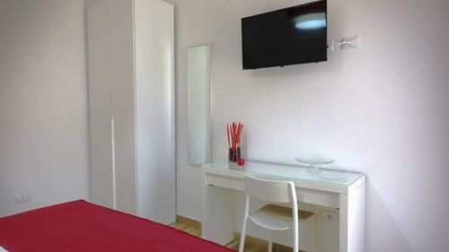 TV a/nebo společenská místnost v ubytování Salento b&b La Casa dei Nonni