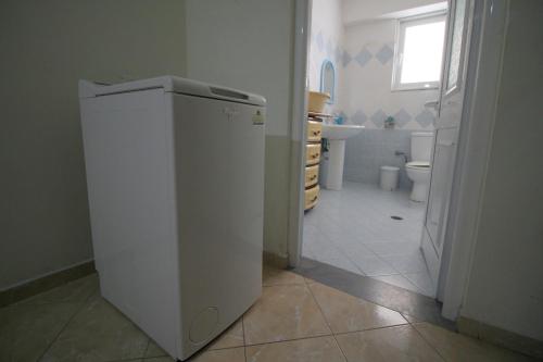 Vonios kambarys apgyvendinimo įstaigoje Mona`s apartments