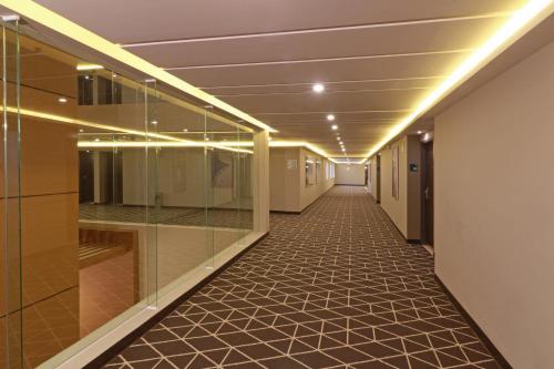 a hallway of an office building with a long corridor at Holiday Inn - Ciudad Juarez by IHG in Ciudad Juárez