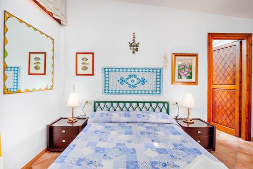 Katil atau katil-katil dalam bilik di Villa a 50 metri dal mare